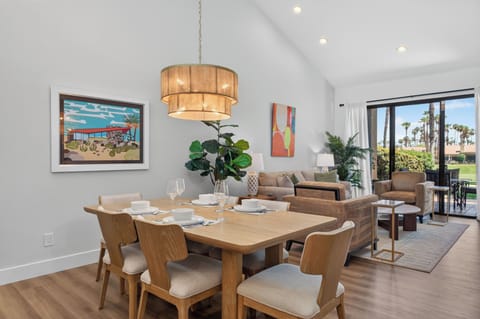 Great Room including the Dining and Living Room looking out to the back patio.