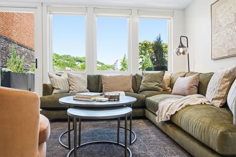 Living Space w/ Smart TV - Open to Kitchen & Roof Top Deck!