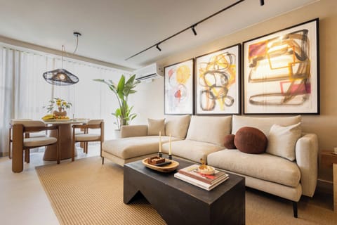 Japandi inspired design living space with cozy seating and elegant dining area