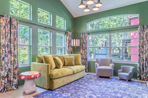 This stylish entertainment room blends comfort and fun, offering the ideal spot for movie nights, board games, and shared moments.