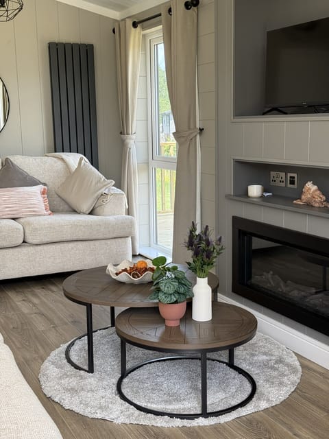 Comfortable living room with inviting seating and a relaxing atmosphere for guests to unwind and enjoy their stay.