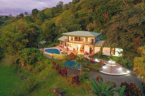 Aerial view of Casa Infinity — private hilltop villa nestled in the Hills of Portalón, Manuel Antonio