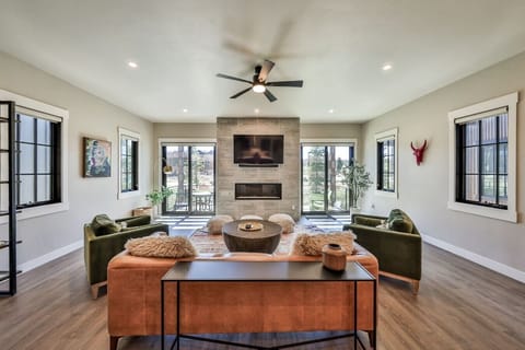 Upscale living room with fireplace and smart tv