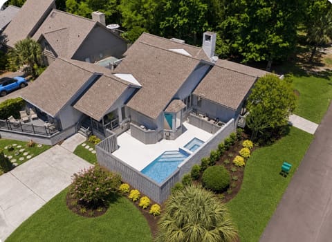 Drone shot of  the entire property including pool, spa recent landscaping adds.