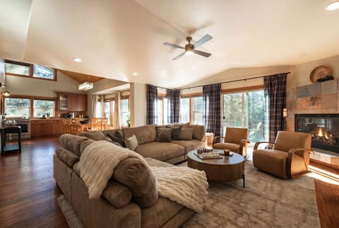 Unwind on the plush sectional and comfy arm chairs with plenty of room for the whole group to relax after a day of outdoor adventures.