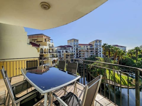 Your balcony is accessible through the living room. Here you can seat 4-5 guests for dining. The sliding doors can open but please be cautious when staying with minors. 