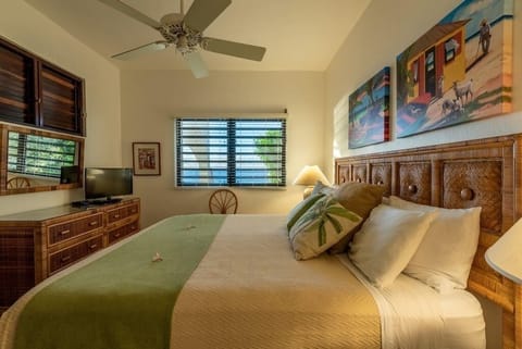 Wake slowly with soft light and breezy island comfort.