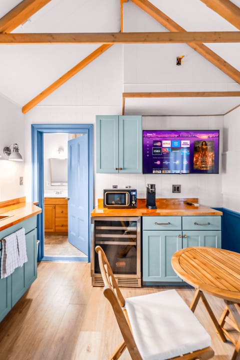 Kick back with your favorite shows after a day of exploring in this bright and thoughtfully designed studio retreat.