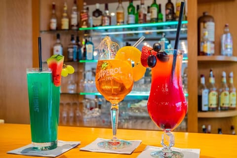 Sip vibrant signature cocktails crafted fresh at the bar.
