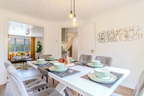 Bright modern dining room with stylish seating for six