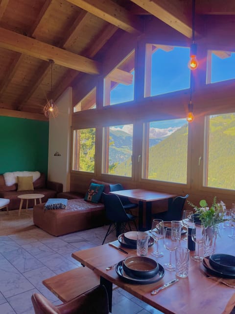 Bright alpine living space with panoramic mountain views