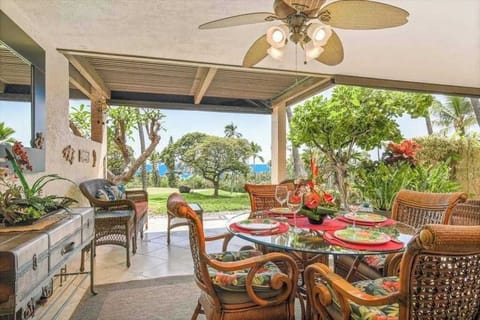 Covered Outdoor Lanai with Dining & Tropical Garden Views