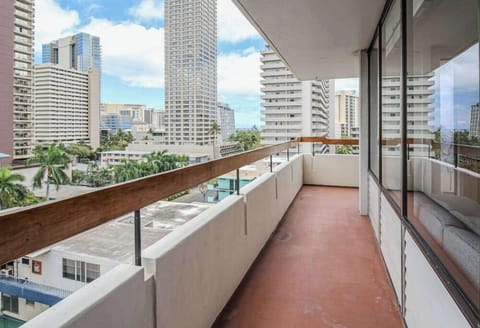 Unwind outdoors while overlooking the beautiful city skyline from the balcony.