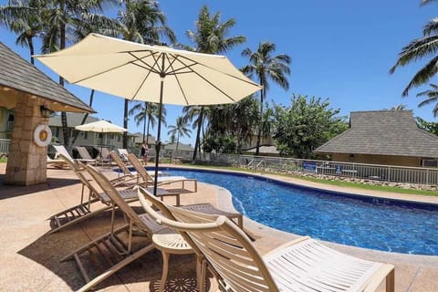 Take a refreshing dip and unwind by the shared pool, perfect for relaxing and enjoying sunny days.