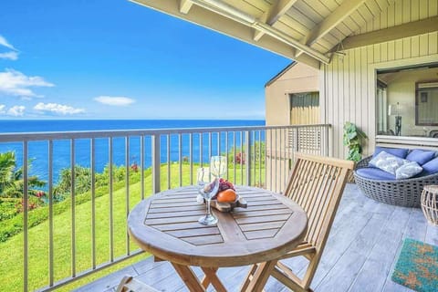 Relax on the covered lanai overlooking the Pacific Ocean.