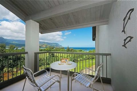 Enjoy morning coffee on the balcony with peaceful tropical views