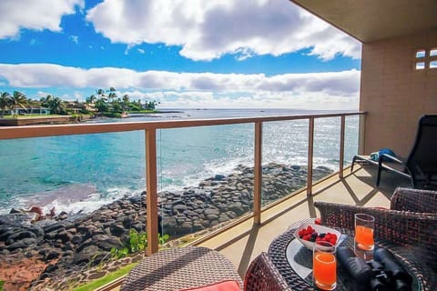 Views of the turquoise waves crashing onto the rocks below from the comfort of your private lanai.