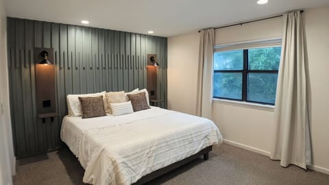 Primary bedroom with King bed and ensuite bathroom