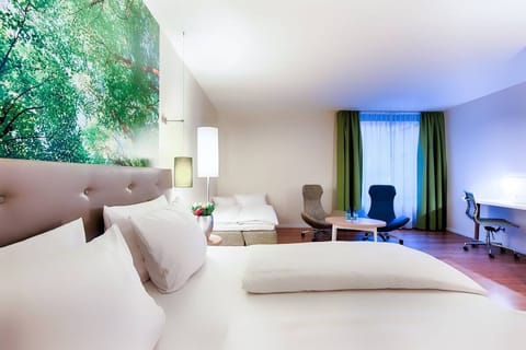 Spread out comfortably with extra beds and a sitting area.