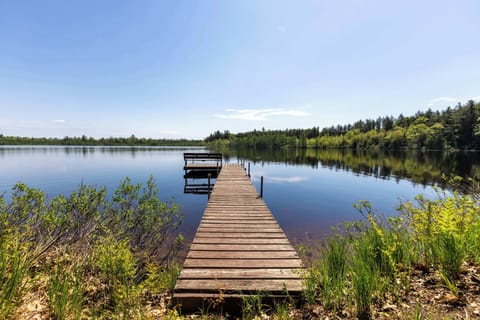 Large dock available for watercraft docking. Lake is shallow so best for pontoon. Boat launch nearby. Property is on Second Lake aka on the Moen Chain of Lakes