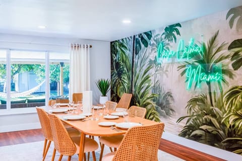 Japandi-Boho living room, every piece brand new. Smart TV and sound system, room-darkening shades for afternoon naps, and a separate space from the dining area so late talkers don't wake early sleepers.
