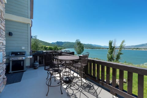 Private deck overlooking Pineview Reservoir, perfect for outdoor dining and morning coffee.