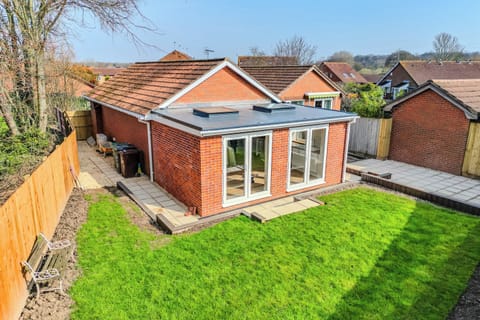 Private rear garden with patio area