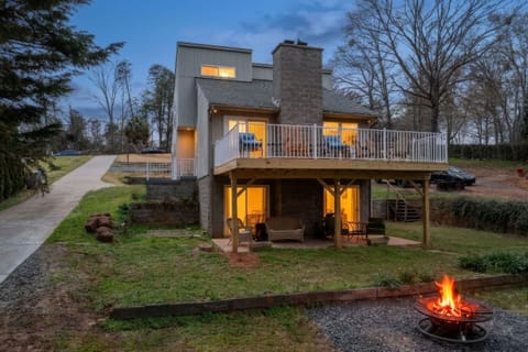 The exterior of our home; welcome! Our spacious deck faces the water.