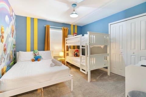 A playful bunk room gives kids their own fun space to settle in after a full day of adventures.