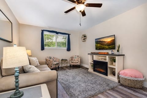 Sink into the cozy living room after a day of exploring the Smokies. Curl up by the fireplace, stream your favorite movie, or simply enjoy a quiet evening together.