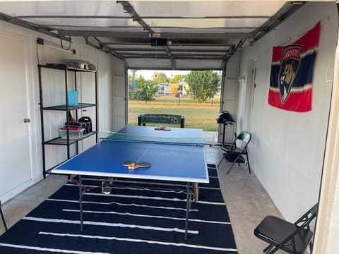 Your private garage game room brings the fun home with ping pong, foosball and games for all ages.