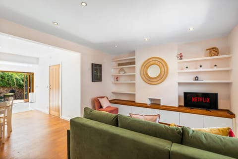 spacious living area on the ground floor with access to the outdoor patio area 