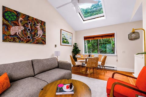 Enjoy an open living space where natural light and woodland views take center stage