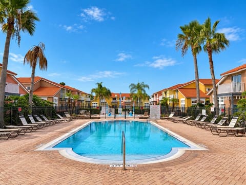 Resort-style pool with plenty of loungers and a separate area for children.