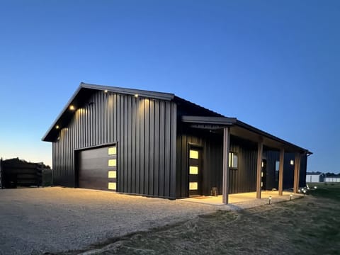 Modern charm meets nature's tranquility under stunning twilight skies!
