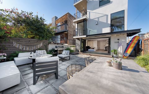 Private, multi-level outdoor courtyard offering a serene oasis perfect for dining and entertaining.