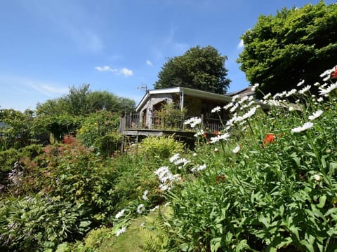 View towards the property nestled in beautiful surrounding gardens