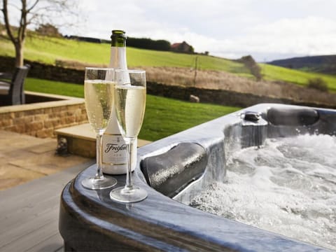  Sit in the hot tub, take in the fresh air and enjoy the view