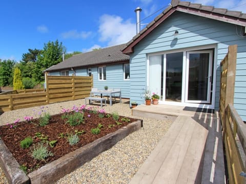 View towards the property and enclosed garden with field views 