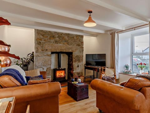 A lovey wood burner assures cosy nights in