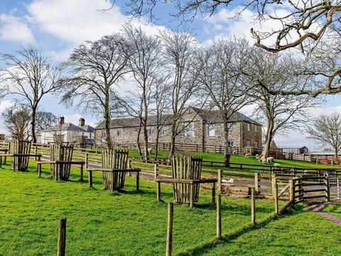 Barn conversion within a farm complex surrounded by countryside