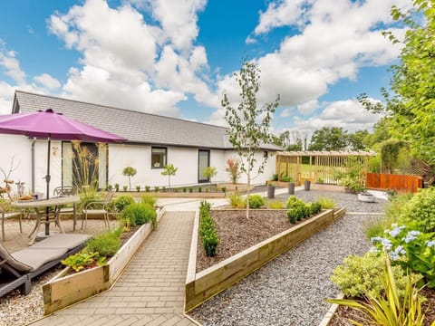 Landscaped front garden with seating