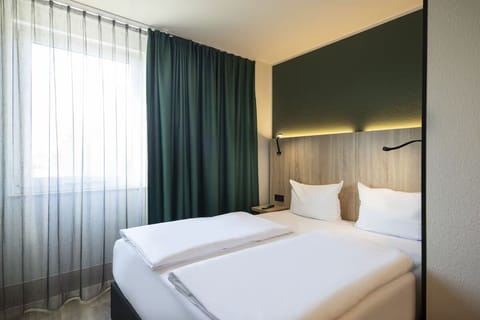 Wake gently to daylight filtering through soft, calming curtains.