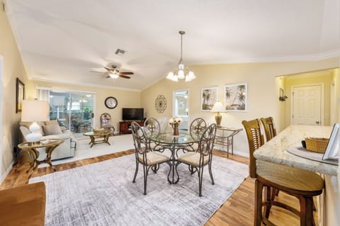 Open Floorplan with Large Sliders to Enclosed Lanai