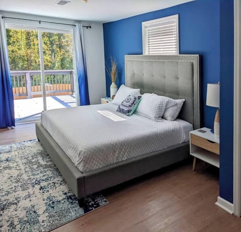 Bedroom 1- King bed, dresser, 2 night stands,  and closet.