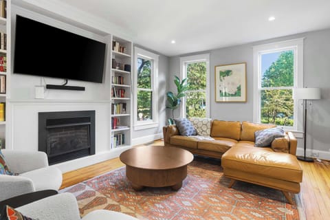 Gather, unwind, and make yourself at home in this sun-filled living space