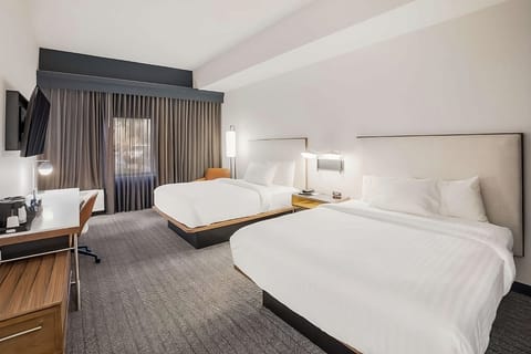 Settle into two plush beds for effortless group stays.