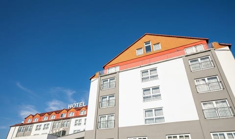 Enjoy an elevated outlook over the hotel and nearby neighborhood.