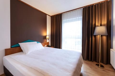 Wake to soft daylight filtering through blackout curtains.