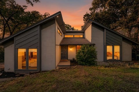 Beautifully illuminated at sunset, this thoughtfully remodeled home offers comfort, privacy, and a relaxing retreat after a day exploring Arlington.